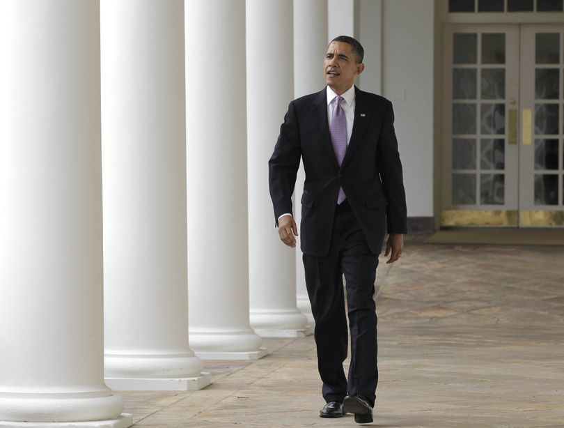 On the day of his State of the Union address, President Barack Obama strides from the Oval Office along the Colonnade at the White House in Washington, Tuesday, Jan. 25, 2011. (J. Applewhite / Associated Press)