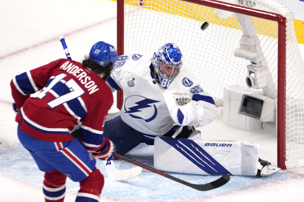 The Canadiens’ Josh Anderson, foreground, scores past Tampa Bay goaltender Andrei Vasilevskiy during the first period of Game 4 Monday night in Montreal.  (Paul Chiasson)