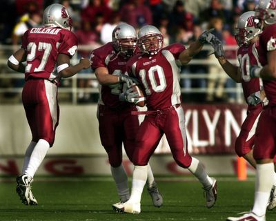 Washington State University defensive back Billy Newman points to the crowd after picking off an Oregon State pass on Oct. 6, 2001 at Gesa Field in Pullman. Newman was named head coach at Ferris High School in February.  (SR)