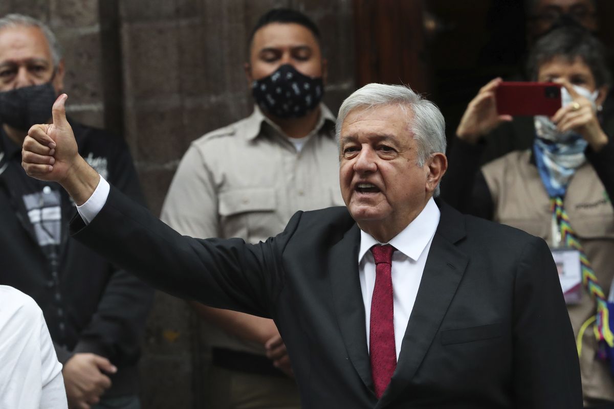 Mexico’s President Andres Manuel Lopez Obrador gives the thumbs-up sign after voting in mid-term elections in Mexico City on Sunday.  (Marco Ugarte)