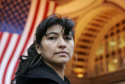 
Betsy Camacho, of Lynn, Mass., an immigrant from El Salvador,  hopes to become a citizen in time to vote in next year's presidential elections. Associated Press
 (Associated Press / The Spokesman-Review)