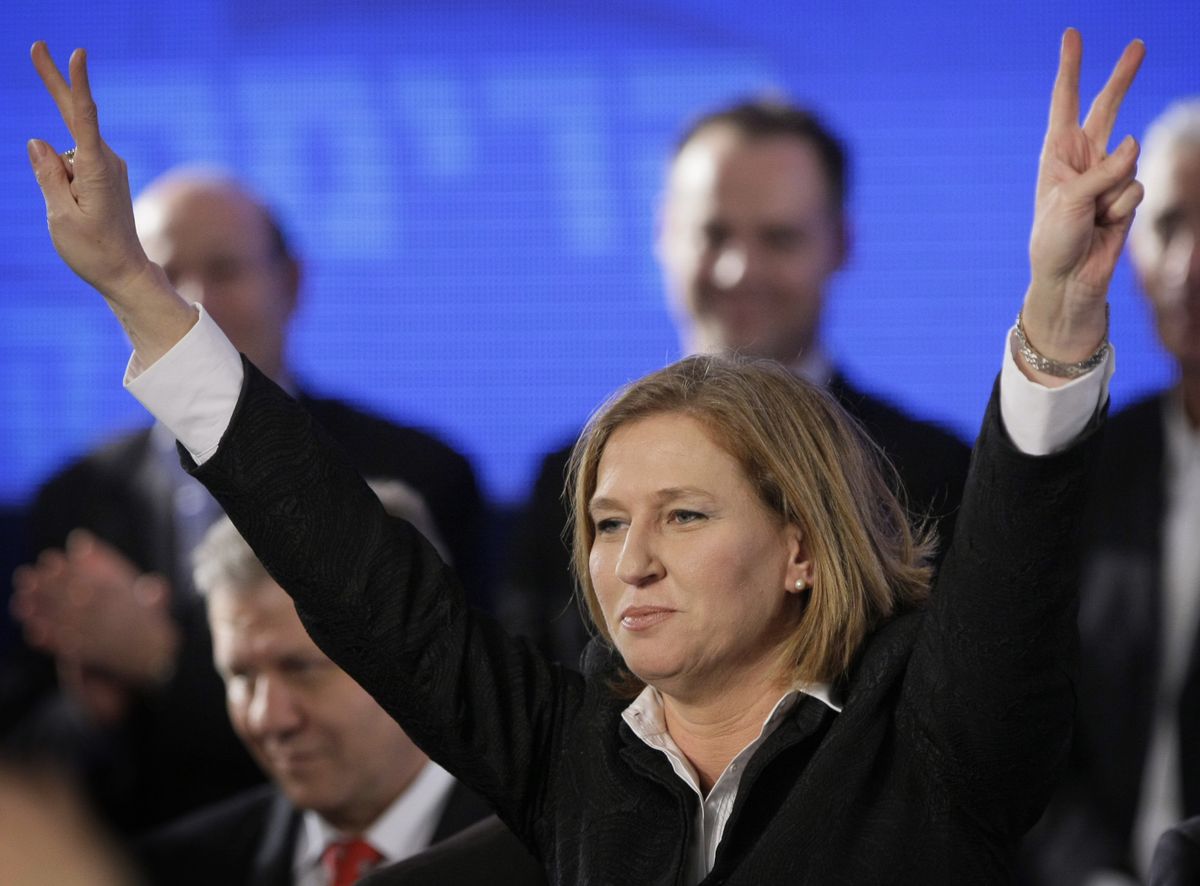 Israel’s foreign minister and Kadima Party leader Tzipi Livni reacts during an election night rally in Tel Aviv on Tuesday.  (Associated Press / The Spokesman-Review)