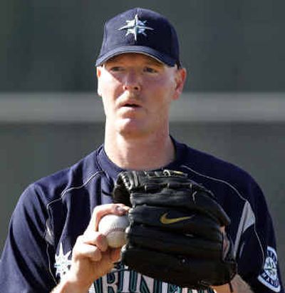 Jeff Nelson gets ready to throw at spring training workouts last week, attempting to make the Seattle Mariners' roster for a third stint.
(Associated Press / The Spokesman-Review)