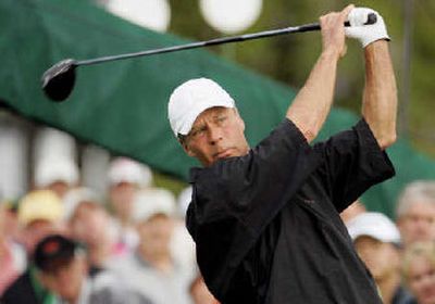 
Ben Crenshaw tees off on the first hole during  third-round play. 
 (Associated Press / The Spokesman-Review)