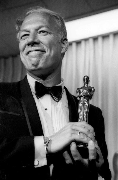 George Kennedy poses with his Oscar in 1968  after winning best supporting actor for his portrayal of a chain gang convict in 