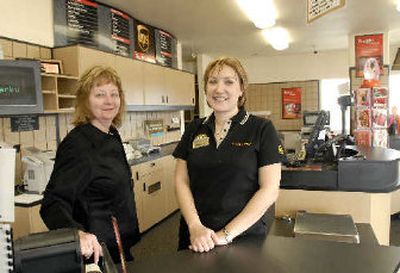 
Robin Erny, right, and Pam Noyes, left, work at the newly constructed UPS Store at 1869 Seltice Way in Post Falls. The store replaces the former store at 1602 Seltice Way. 
 (Jesse Tinsley / The Spokesman-Review)