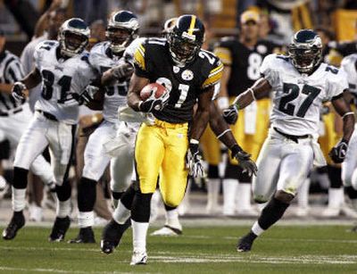 
Steelers punt returner Ricardo Colclough outruns the Eagles special teams unit on his way to a 66-yard touchdown.
 (Associated Press / The Spokesman-Review)