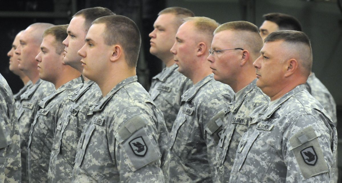 Members of the Washington Army National Guard 1041st Transportation Company line up during a farewell ceremony Saturday at the National Guard Readiness Center in Spokane. The company is being sent overseas as part of Operation Iraqi Freedom.  (Photos by Dan Pelle / The Spokesman-Review)