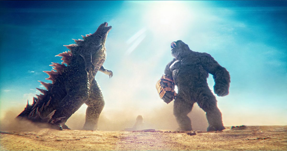 Godzilla, left, and Kong in a scene from the movie "Godzilla x Kong: The New Empire."   (Courtesy Warner Bros. Pictures/TNS/TNS)