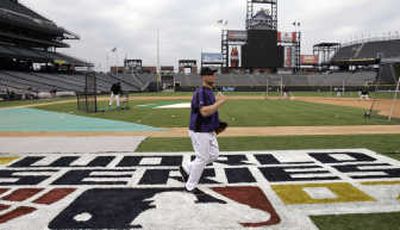 
Matt Holliday and the rest of the Rockies are back on home turf. Associated Press
 (Associated Press / The Spokesman-Review)
