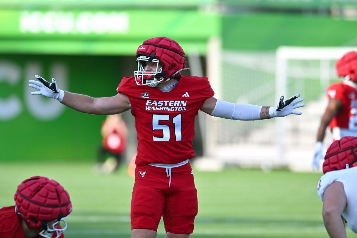 Eastern Washington Eagles linebacker Gage Brumfield (51) relays the play call during a practice on Thursday at ONE Spokane Stadium. (James Snook/For The Spokesman-Review)