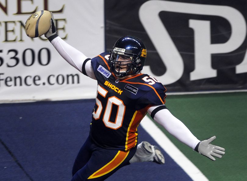 Shock linebacker Kevin McCullough soaks in the cheers after scoring on an interception late in the first half April 3, 2009, against Stockton. The Shock won. (Colin Mulvany / The Spokesman-Review)