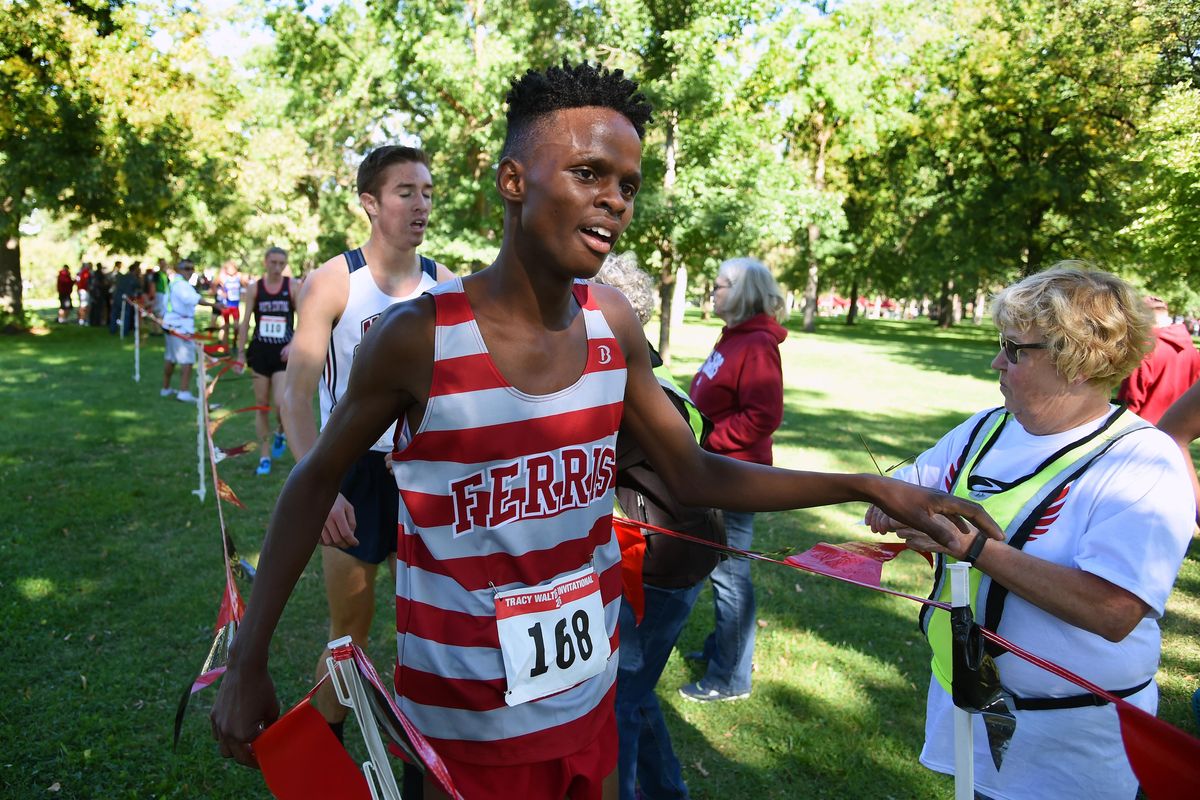 At the Tracy Walters cross country meet, Amir Ado of Ferris edged Mt. Spokane’s Hayden Dressel to win the 4A cross county race last Saturday at Audubon Park. (Colin Mulvany / The Spokesman-Review)