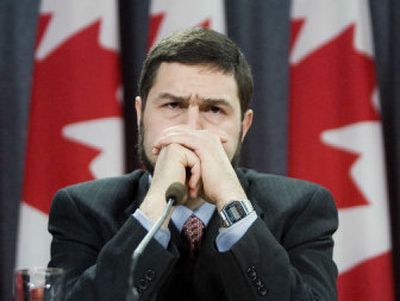 
Maher Arar listens to a reporter's question about the Canadian government's apology and compensation package on Friday. 
 (Associated Press / The Spokesman-Review)