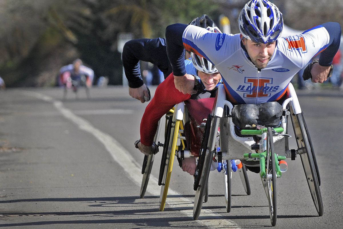 Elite wheelchair racers pack together and try to catch the leader at the top of Doomsday Hill. (Christopher Anderson)