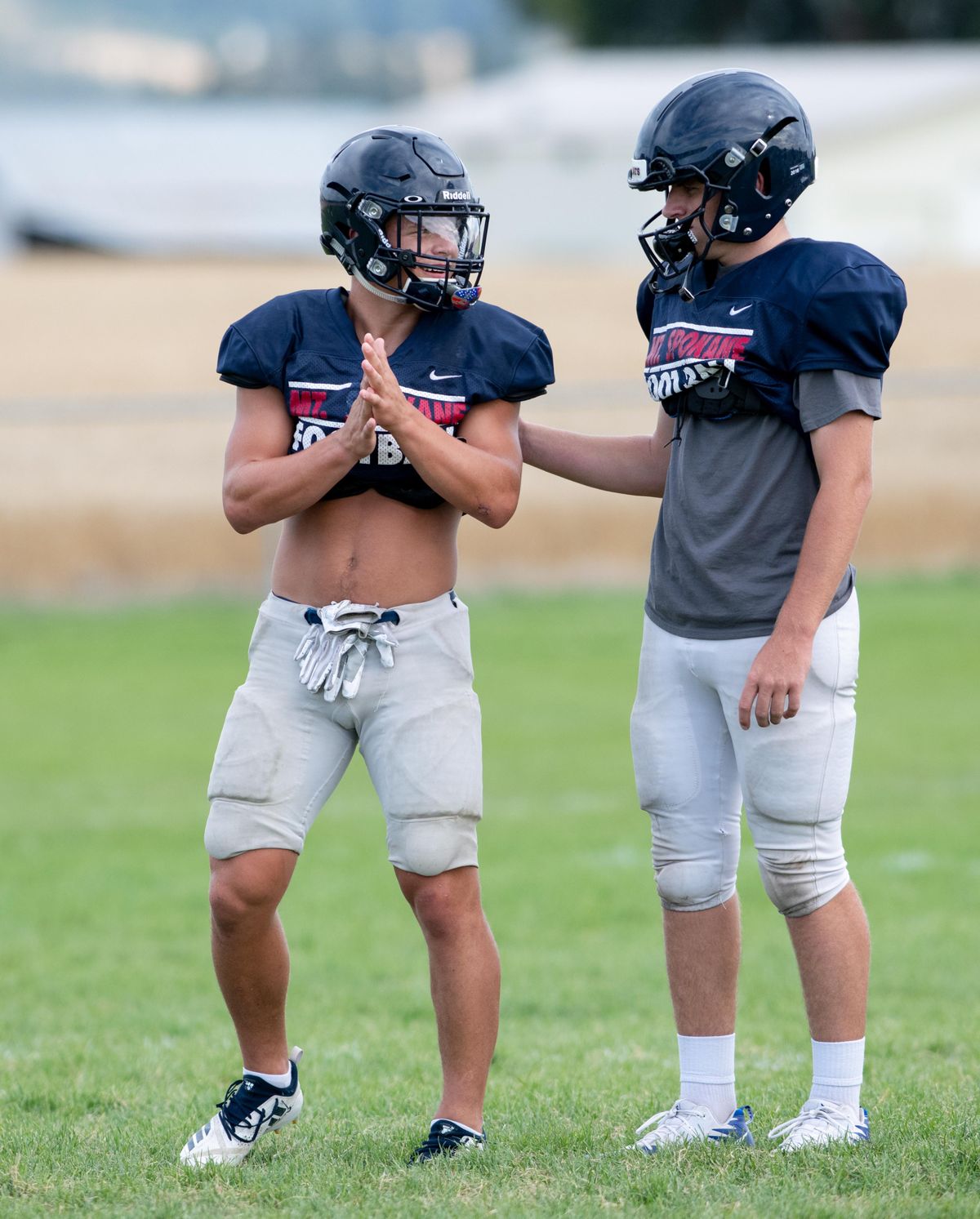 Slotback Kannon Katzer, left, and quarterback Jeter Schuerman, right, are shown working out at Tuesday, Sept. 3, 2019. The two are part of the talented core of the Mt. Spokane Wildcats, who play their first game against Glacier (Kalispell, MT) Friday. (Jesse Tinsley / The Spokesman-Review)