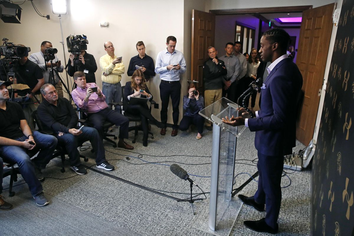 Newly-signed Baltimore Ravens backup quarterback Robert Griffin III speaks at an NFL football news conference at the team