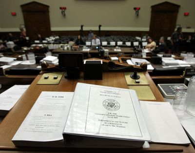 A copy of H.R. 3200, the America’s Affordable Health Choices Act of 2009, sits on the desk of House Energy and Commerce Committee Chairman Rep. Henry Waxman, D-Calif. The markup of the bill had been postponed Wednesday.  (Associated Press / The Spokesman-Review)