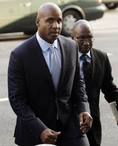 Barry Bonds arrives at the federal courthouse for the second day of his trial in San Francisco,  Tuesday, March 22, 2011. Now that a jury has been selected, the prosecutors and the slugger's lawyers are scheduled to deliver opening statements. (Marcio Sanchez / Associated Press)