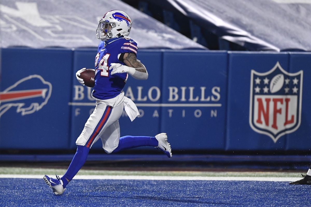 Buffalo Bills’ Taron Johnson returns an interception for a touchdown on Saturday in Orchard Park, N.Y.  (Associated Press)