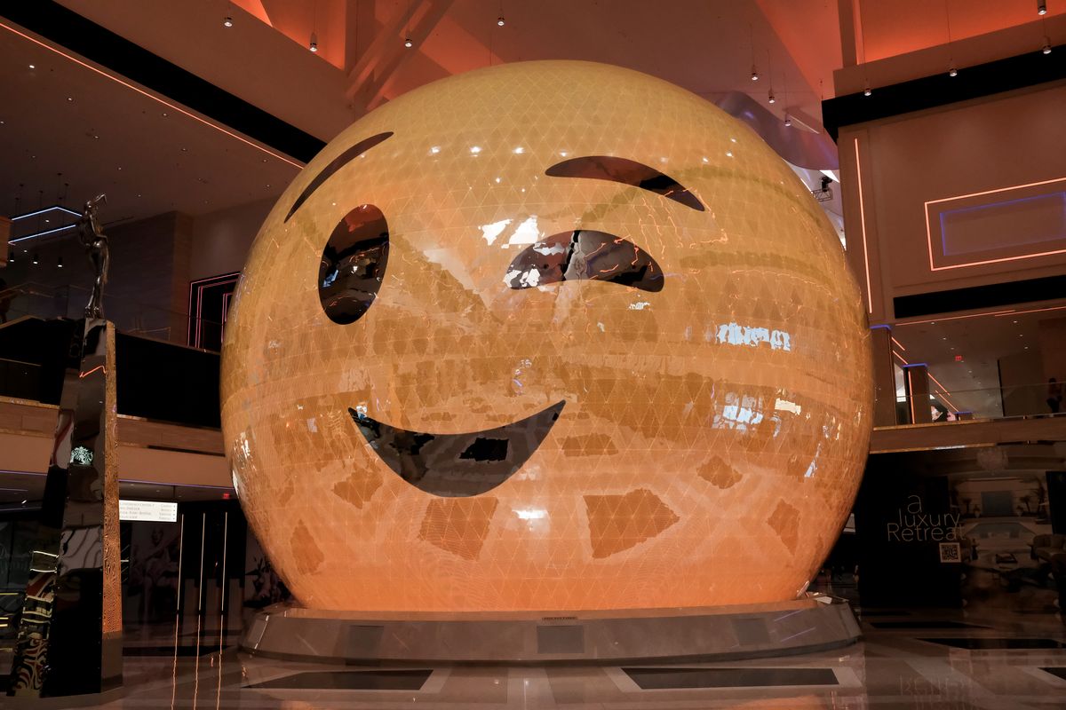 A 50-foot-tall digital sphere, displaying a winking emoji, welcomes visitors Wednesday at Resorts World Las Vegas.  (Tyler Tjomsland/The Spokesman-Review)