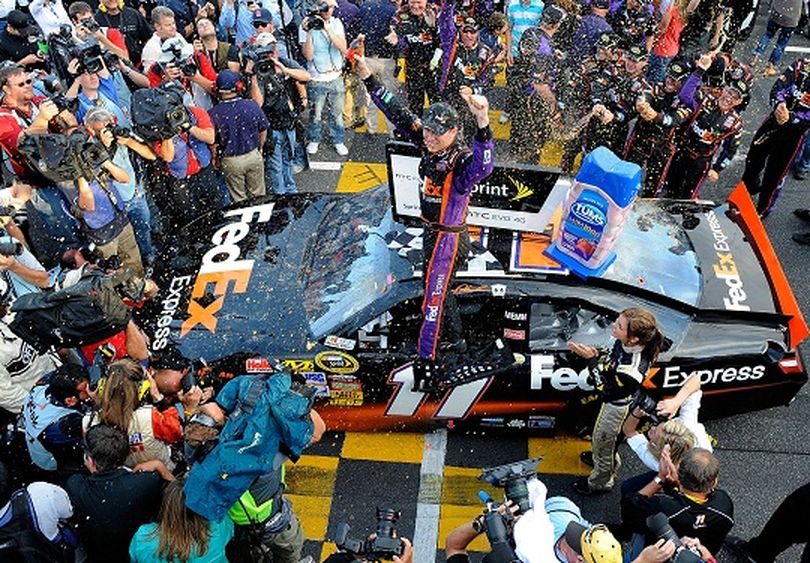 Denny Hamlin celebrates his TUMS Fast Relief 500 win in Victory Lane at Martinsville Speedway. (Photo Credit: Jared C. Tilton/Getty Images) (Jared Tilton / Getty Images North America)