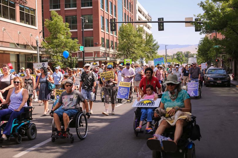 Hundreds marched in Boise over the weekend to protest proposed cuts to Medicaid services for the disabled in Idaho, under the current Senate GOP health care proposal. The rally was part of an effort in more than 30 states to object to provisions of the proposed bill. (Melanie Folwell)