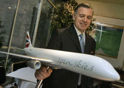 
Dale Moss, managing director of the new airline OpenSkies, poses with a model of its Boeing 757. The airline, an endorsed brand from British Airways, is scheduled to launch in June and will operate from New York to Brussels and Paris. Associated Press
 (File Associated Press / The Spokesman-Review)