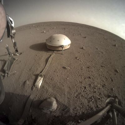 The InSight lander's dome-covered seismometer, known as SEIS, is shown Feb. 18, 2020, on Mars. On Monday, Feb. 24, 2020, scientists reported that the spacecraft has detected hundreds of quakes and even aftershocks that are regularly jolting the red planet. (JPL-Caltech via)
