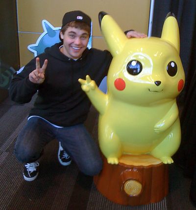 Dylan Schmidt poses with the Pokemon Pikachu character at the state championship in March.