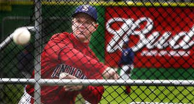 
Indians manager Darryl Kennedy pitches batting practice to his new players on Friday at team's minicamp taking place at Avista Stadium. He is 6 for 6 in leading his minor league teams to the postseason.
 (Christopher Anderson/ / The Spokesman-Review)