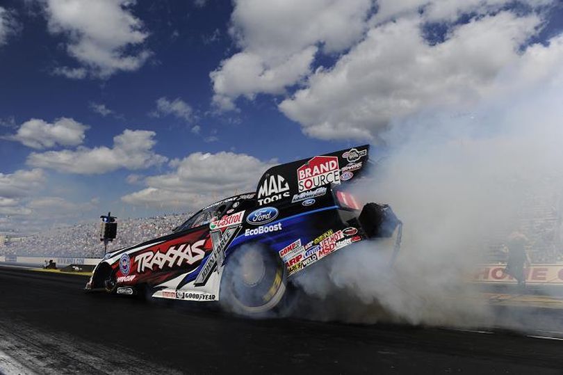 Courtney Force powered her Traxxas Ford Mustang to a career-best performance of 4.049 seconds at a track record speed of 317.27 mph to take the top Funny Car qualifying spot in the 2012 U.S. Nationals. (Photo courtesy of NHRA)