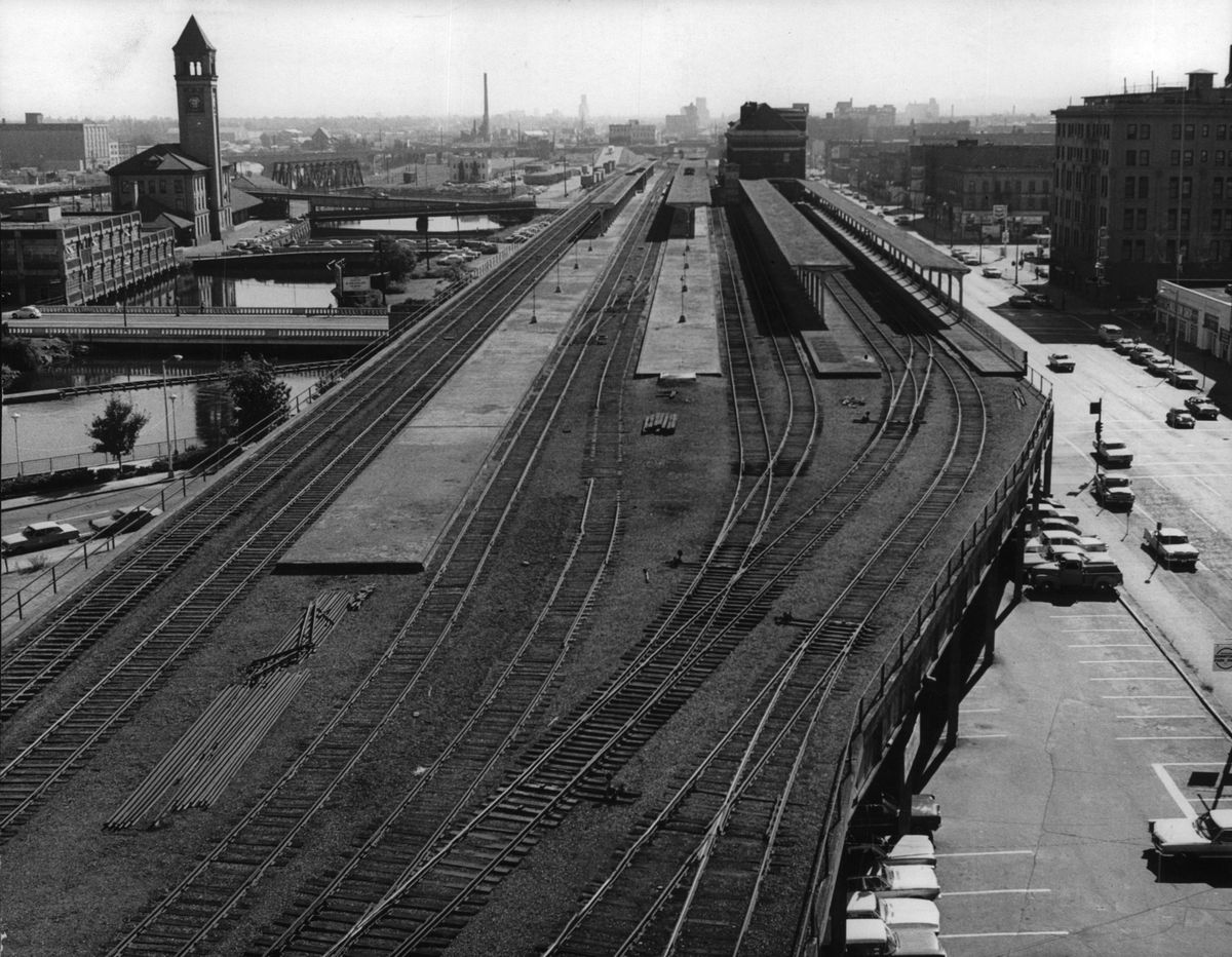 1971: The Union Pacific-Milwaukee Road tracks and trestles along Trent Ave., stretching eastward to the Union Station at upper right. After much negotiation between Expo organizers and the Union Pacific and Milwaukee Road, the trestle and station property are included in the railroads’ combined gift to Spokane and Expo ’74. The Burlington Northern earlier announced its donation of several acres of land and the old Great Northern Depot, with its iconic clocktower, at the upper left. Value of the properties exceeds $4 million. Without the railroads’ cooperation and donations, Expo ’74 would not have happened. (SPOKESMAN-REVIEW PHOTO ARCHIVE / SR)