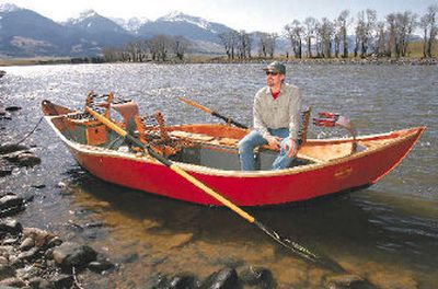 
Montana Boatbuilders owner Jason Cajune sits in a drift boat on the Yellowstone River in the Paradise Valley near Livingston, Mont.
 (Associated Press / The Spokesman-Review)
