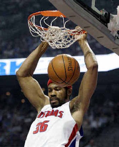 
Detroit's Rasheed Wallace finishes off a first-quarter dunk on Tuesday.
 (Associated Press / The Spokesman-Review)