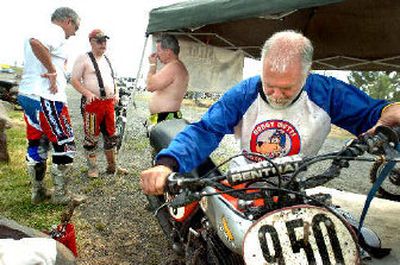 
Charlie Branstetter,  of Bonney Lake, Wash., gets his 1975 Honda Elsinore ready for the afternoon heats Sunday at the Spokane County ORV Park. 
 (The Spokesman-Review)