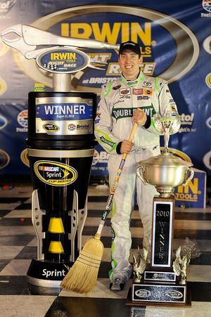 Kyle Busch busted out the broom, becoming the first driver in NASCAR history to win all three national series races in the same weekend. (Photo courtesy of John Harrelson/Getty Images for NASCAR)  (Rusty Jarrett / Getty Images North America)