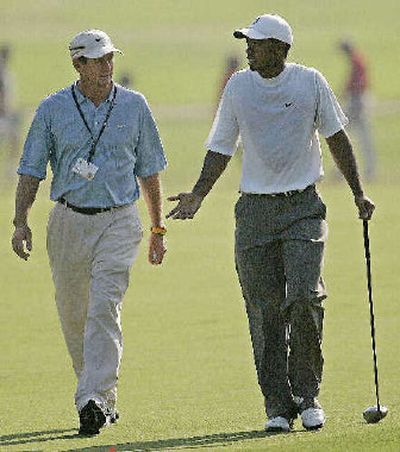
Tiger Woods, right, spent a lot of time frustrated under swing coach Hank Haney.
 (File/Associated Press / The Spokesman-Review)