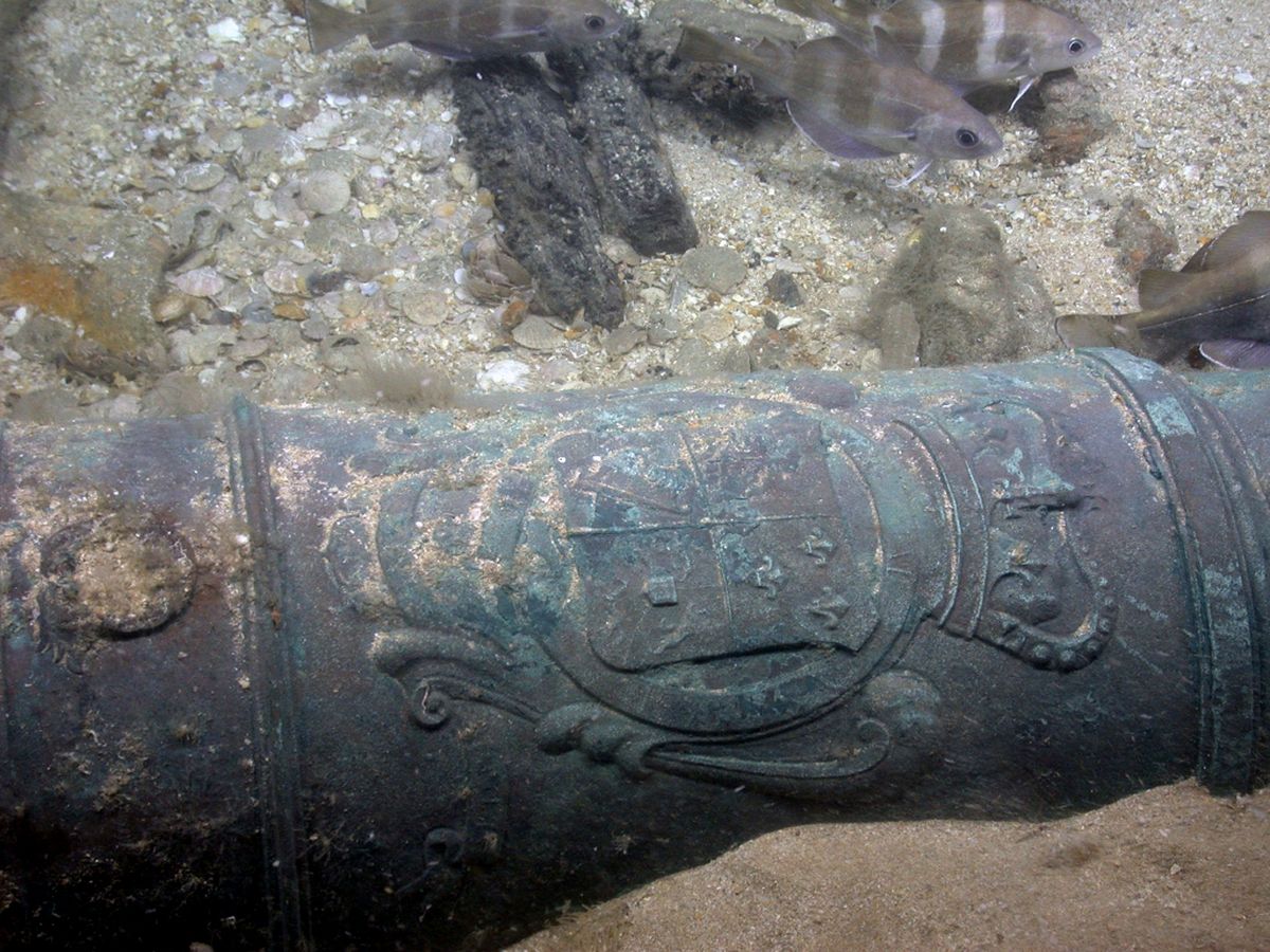 This bronze cannon was photographed by the Odyssey Explorer’s remotely operated vehicle at the shipwreck site of HMS Victory. It bears the royal crest of King George I. (Photos by Associated Press/Odyssey Marine Exploration / The Spokesman-Review)