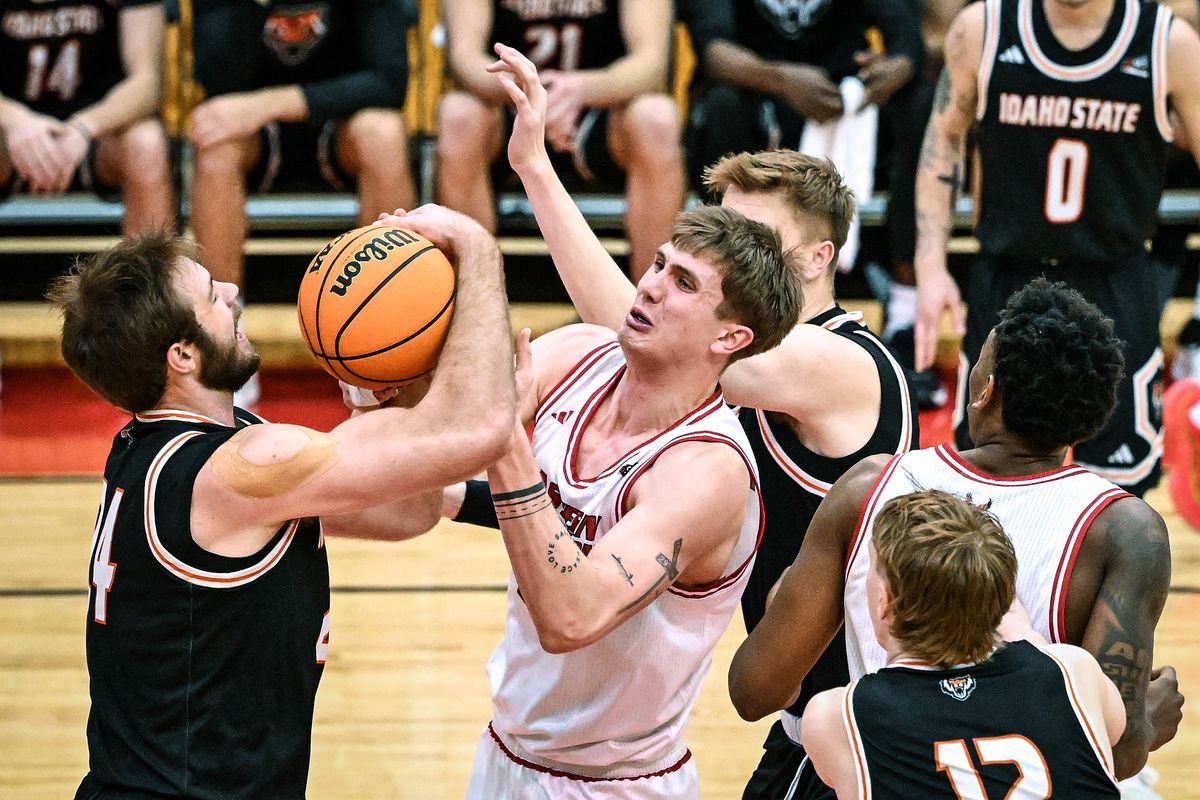 Idaho State forward Caleb van de Griend (24) steals the ball away from Eastern Washington forward Emmett Marquardt (33) during the first half of a NCAA college basketball game, Thursday, Feb. 12, 2026, in Cheney.  (Colin Mulvany/The Spokesman-Review)