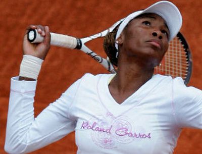 
American Venus Williams prepares to serve to Finland's Emma Laine in their second-round match Wednesday.
 (Associated Press / The Spokesman-Review)