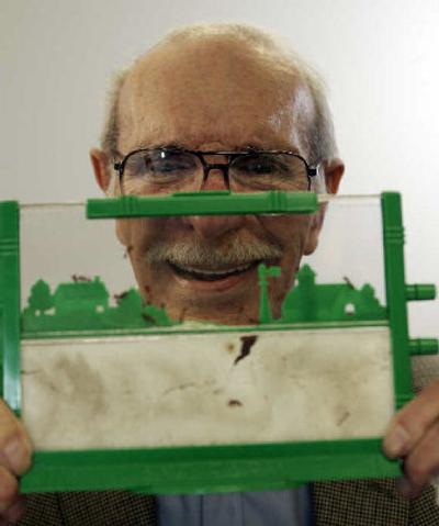 
Milton Levine, creator of the original Ant Farm toy, poses with his invention at the family-owned Uncle Milton Industries office last month in Westlake Village, Calif. The popular Ant Farm has turned ants from unwelcome pests into fascinating house guests, entering millions of homes over the last 50 years. 
 (Associated Press / The Spokesman-Review)
