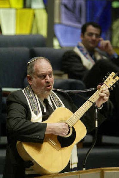 
Cantor Jay Frailich sings as the worship leader at the University Synagogue in Los Angeles, where he has been more than 30 years. 
 (Associated Press / The Spokesman-Review)