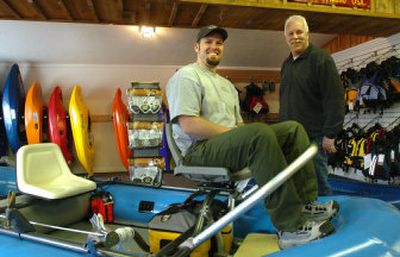 
Aaron Anderson, left, and C.W. Turner are rafting buddies who opened Rapid Sports, 6288 Government Way in Coeur d'Alene. The store  specializes  in kayaking and rafting equipment. 
 (Jesse Tinsley / The Spokesman-Review)