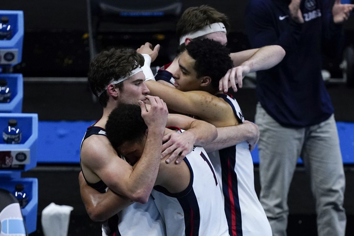 Gonzaga players console one another at the end of the championship game against Baylor in the men’s NCAA Tournament on April 5 at Lucas Oil Stadium in Indianapolis.  (Michael Conroy)