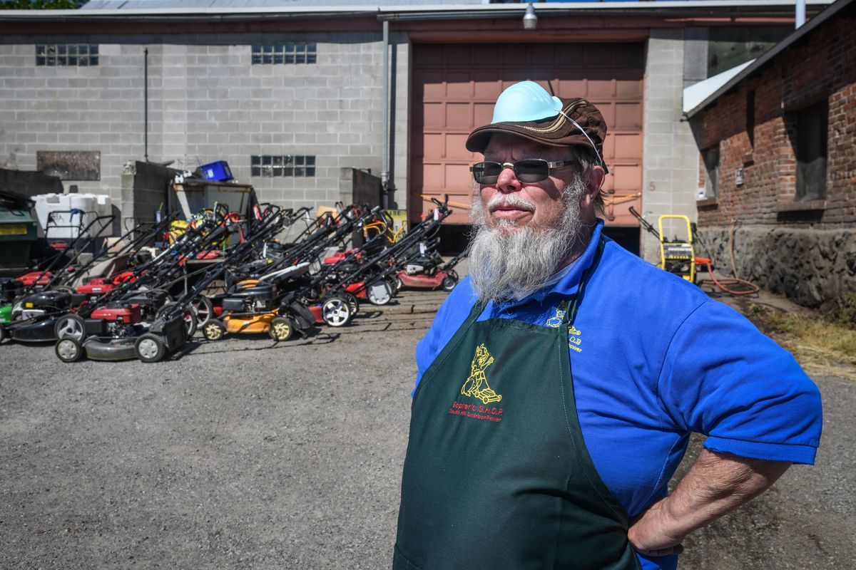 Dale LaBounty, owner at Gopher’s Shop, waits for customers to pick up, Friday, May 29, 2020, in Spokane. LaBounty said on major repair work he