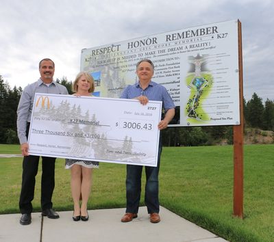 Rathdrum McDonald’s owners Tim and Terri Skubitz presented Coeur d’Alene Mayor Steve Widmyer with a check for $3,006.43 from the July 16 event. (Photo courtesy of city of Coeur d'Alene)