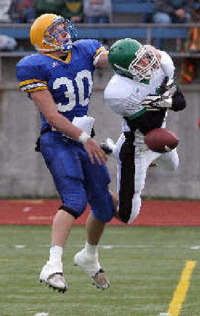 
EV's Chase Courchaine, right, breaks up a pass to Ferndale's Adam Wilgus. 
 (Dan Levine/Special to the Spokesman-Review / The Spokesman-Review)