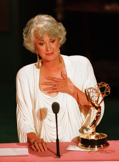 Beatrice Arthur accepts  an Emmy Award for her acting in “Golden Girls” at the 40th annual Emmy Awards ceremony  in August 1988.  (File Associated Press / The Spokesman-Review)