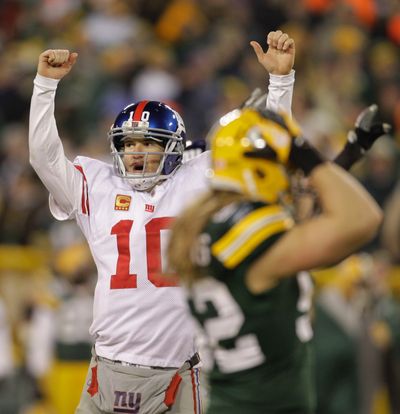 Quarterback Eli Manning enjoyed Giants’ victory over Green Bay last Sunday. (Associated Press)